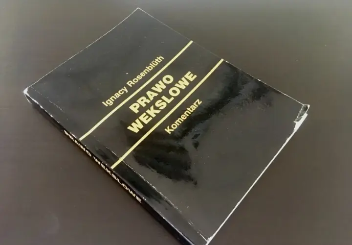 Czarna okładka książki "Prawo wekslowe" Ignacego Rosenblütha, komentarz. Weksel in blanco to ważny dokument.